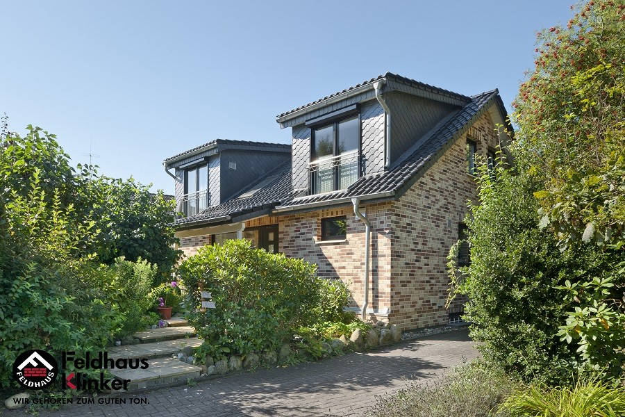 Японские технологии и немецкие традиции: выбрать материал для фасада и кровли